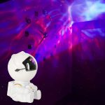 Star projector night light cosmonaut