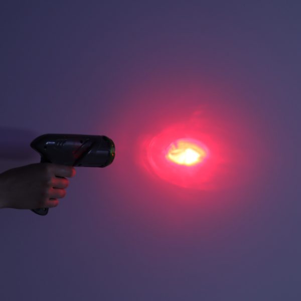 RC laser-controlled car driving on a wall on laser blue