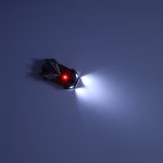 RC laser-controlled car driving on a wall on laser grey
